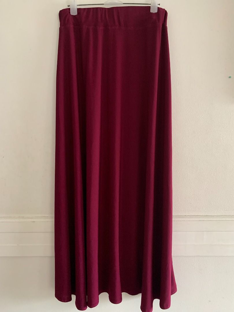 Red/Maroon Maxi A Line skirt (Category: Skirts) located in Taguig. Submitted by declutteringthings0908 (Listing ID 1201907811, Image 1). Description: Waist can still be slightly stretched. Fabric is a bit sheer/thin, suggest to wear seamless/nude undergarments. Fits small to semi medium frames. RFS: decluttering MOP: BPI, BDO, or GCash.