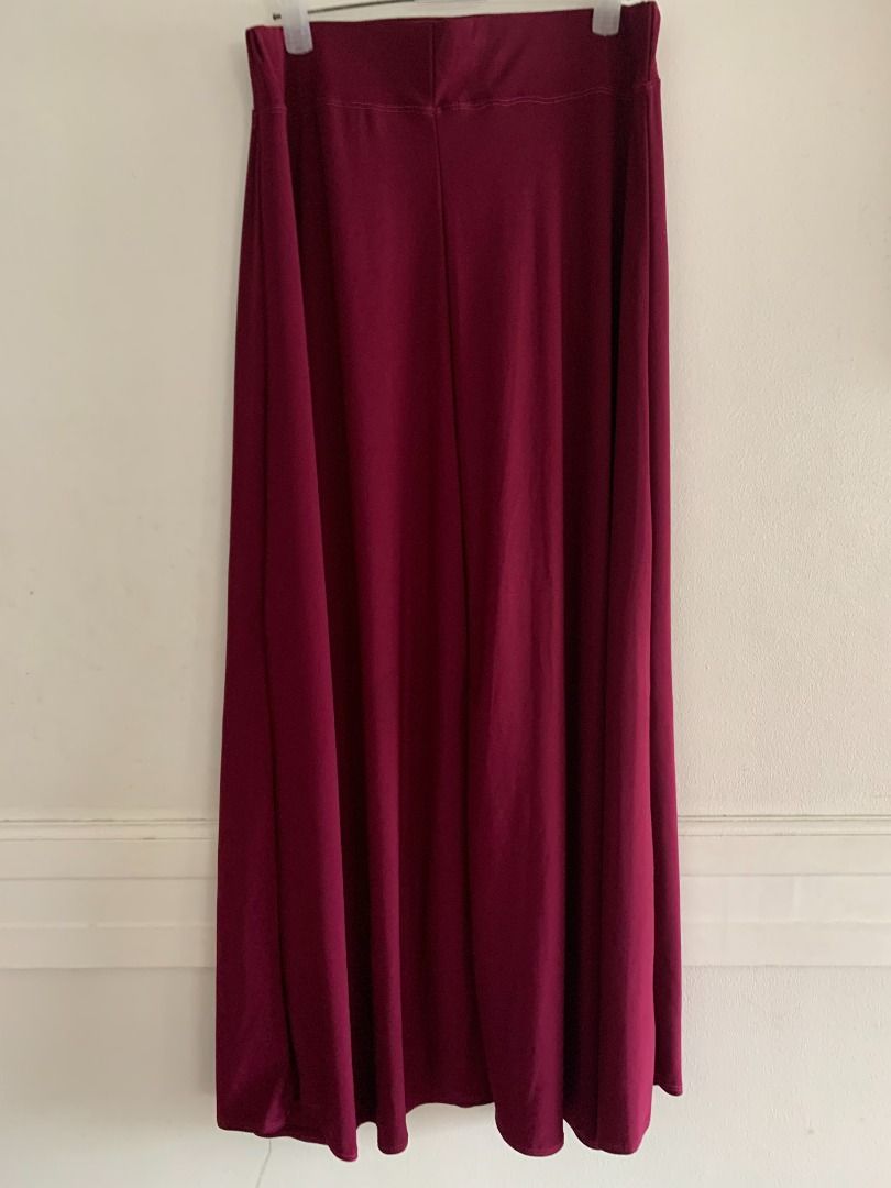 Red/Maroon Maxi A Line skirt (Category: Skirts) located in Taguig. Submitted by declutteringthings0908 (Listing ID 1201907811, Image 2). Description: Waist can still be slightly stretched. Fabric is a bit sheer/thin, suggest to wear seamless/nude undergarments. Fits small to semi medium frames. RFS: decluttering MOP: BPI, BDO, or GCash.