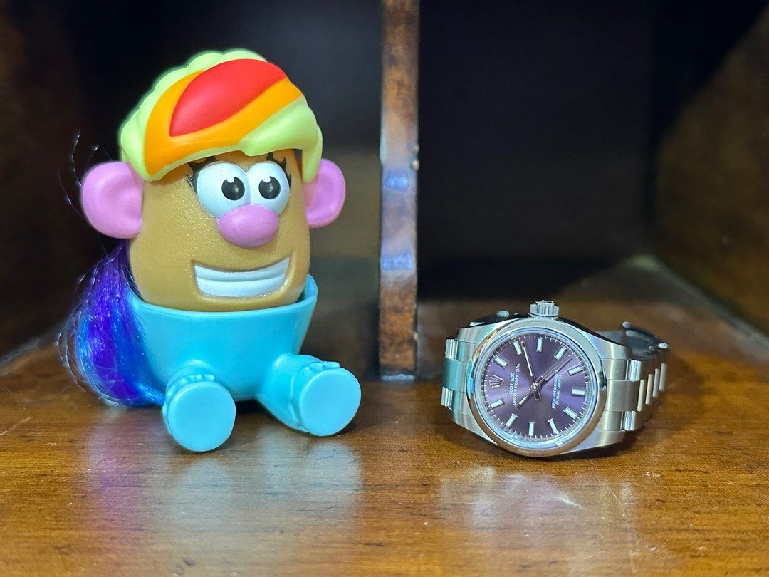 Rolex OP26 Grape 176200 (Category: Watches) located in Singapore. Submitted by cinlye (Listing ID 1201946313, Image 1). Description: Watch: Rolex Oyster Perpetual 26mm Red Grape Model: 176200 Warranty Card Dated: December 2020 Condition: Well worn, no dings or dents. Price: $6,800 (firm) - sale only, no trades Package: Refer to photos. Add $300 for box. This is a discontinued model with the new NFT card. Great to buy and wear with no babying. Tha