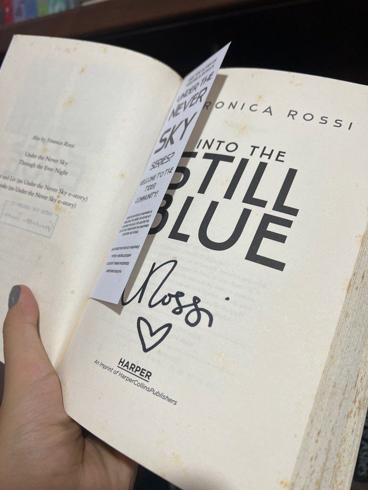 Under the Never Sky Trilogy - SIGNED by Veronica Rossi (Category: Storybooks) located in Malabon City. Submitted by preloved_bygrace (Listing ID 1201864008, Image 2). Description: SIGNED copies!!! 🧡 preloved 🤍 with plastic cover Has slight foxing but in good condition ✨ RFS: decluttering; moving out.