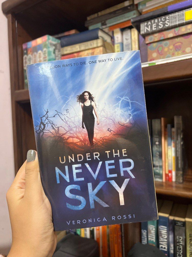 Under the Never Sky Trilogy - SIGNED by Veronica Rossi (Category: Storybooks) located in Malabon City. Submitted by preloved_bygrace (Listing ID 1201864008, Image 3). Description: SIGNED copies!!! 🧡 preloved 🤍 with plastic cover Has slight foxing but in good condition ✨ RFS: decluttering; moving out.