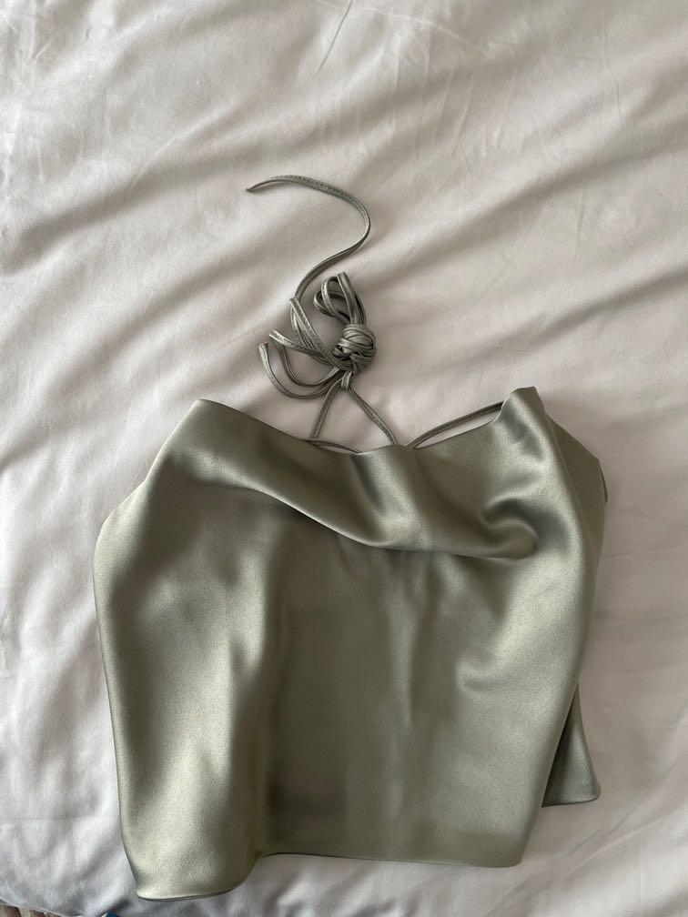 brandy melville silk green top (Category: Sleeveless) located in Muntinlupa City. Submitted by yza_d (Listing ID 1141069623, Image 1). Description: washed but never used! .