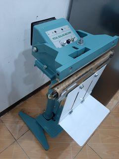 Foot pedal sealing machine