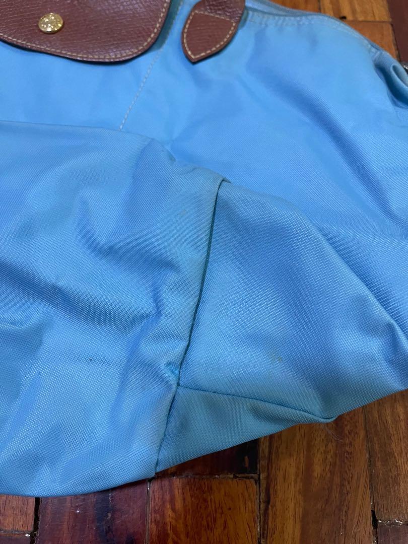 Long Champ Medium Short Handle (Category: Luxury Bags & Wallets) located in Quezon City. Submitted by ellabelles (Listing ID 1141050368, Image 3). Description: Long Champ Medium Short handle Needs cleaning but overall okay.
