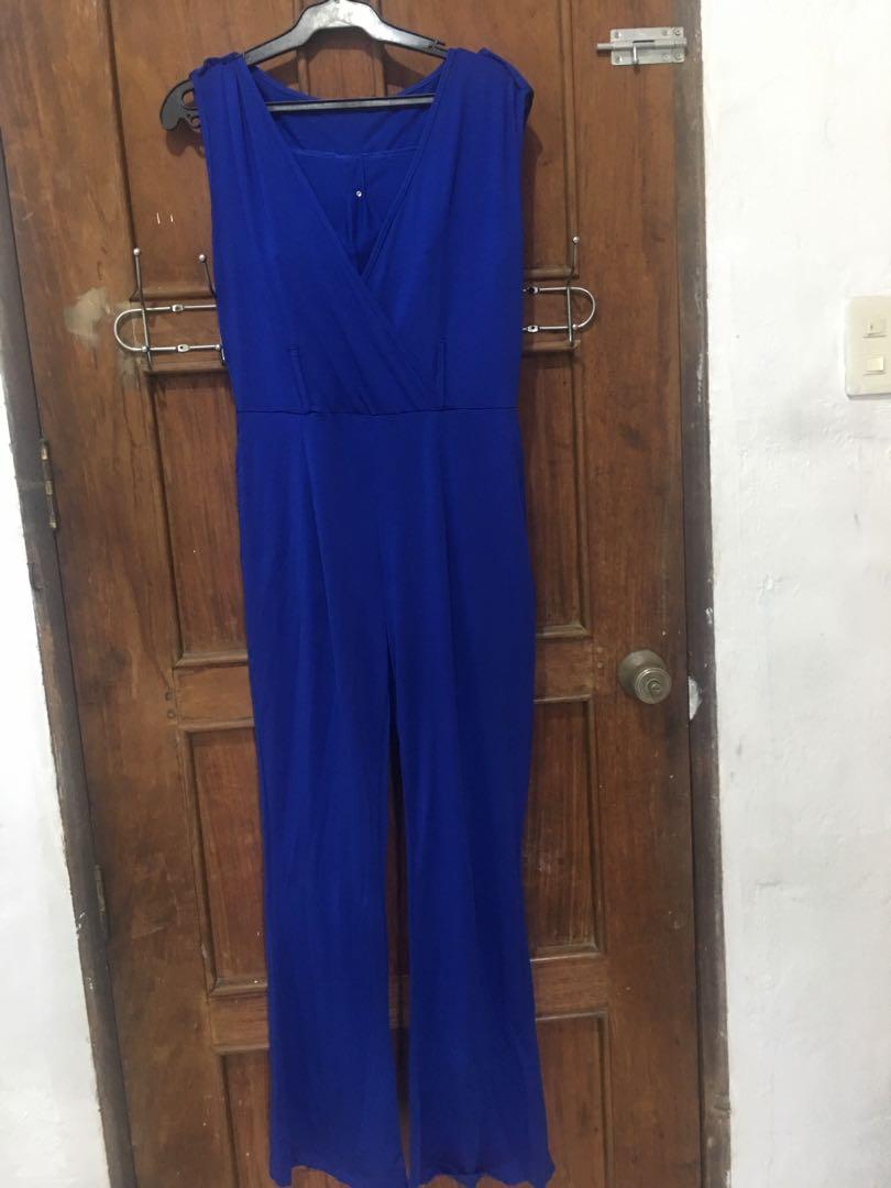 Royal blue overlap sleeveless jumpsuit (Category: Jumpsuits) located in Quezon City. Submitted by mrliban (Listing ID 1141080036, Image 2). Description: Belt is already missing Soft and flowy material.
