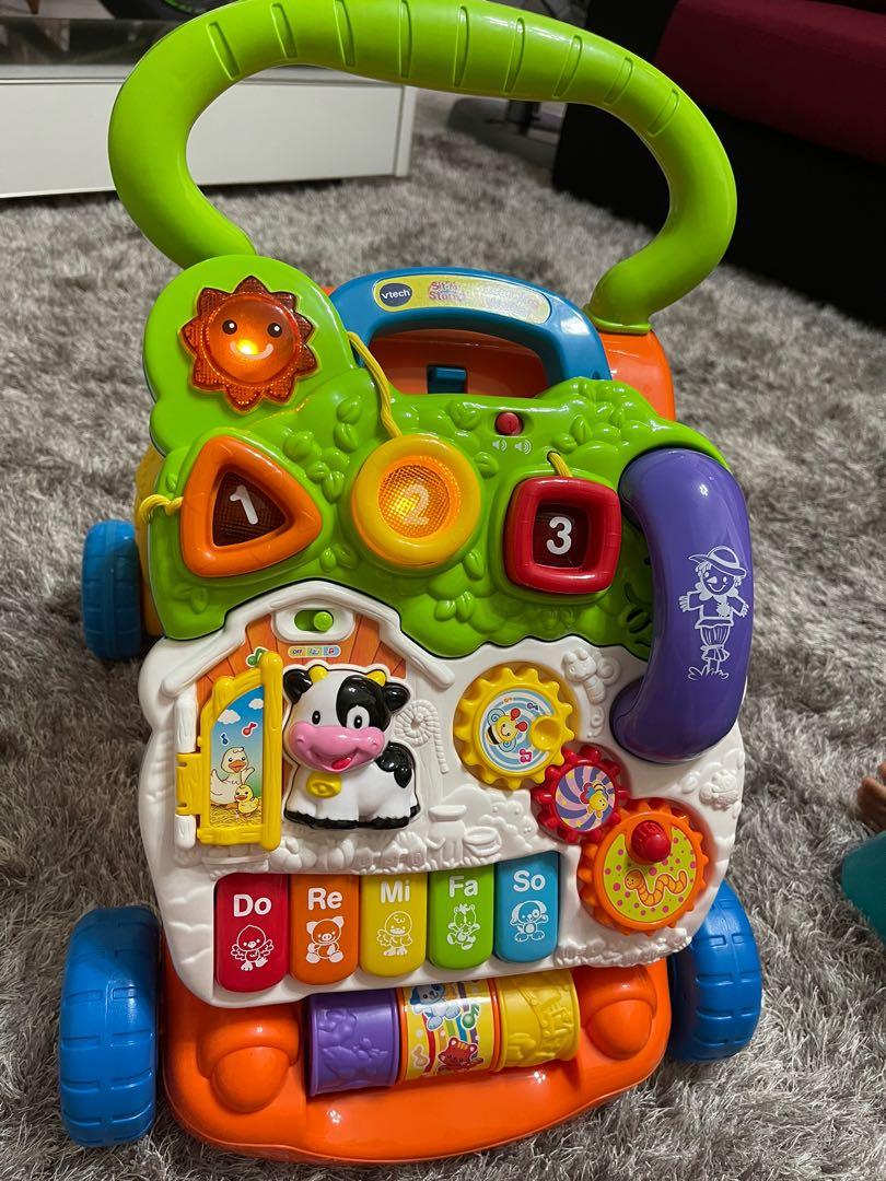Little tikes sit to stand walker store