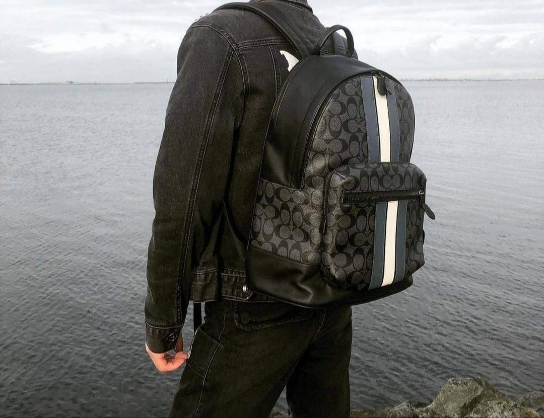 West backpack in signature canvas with varsity hot sale stripe
