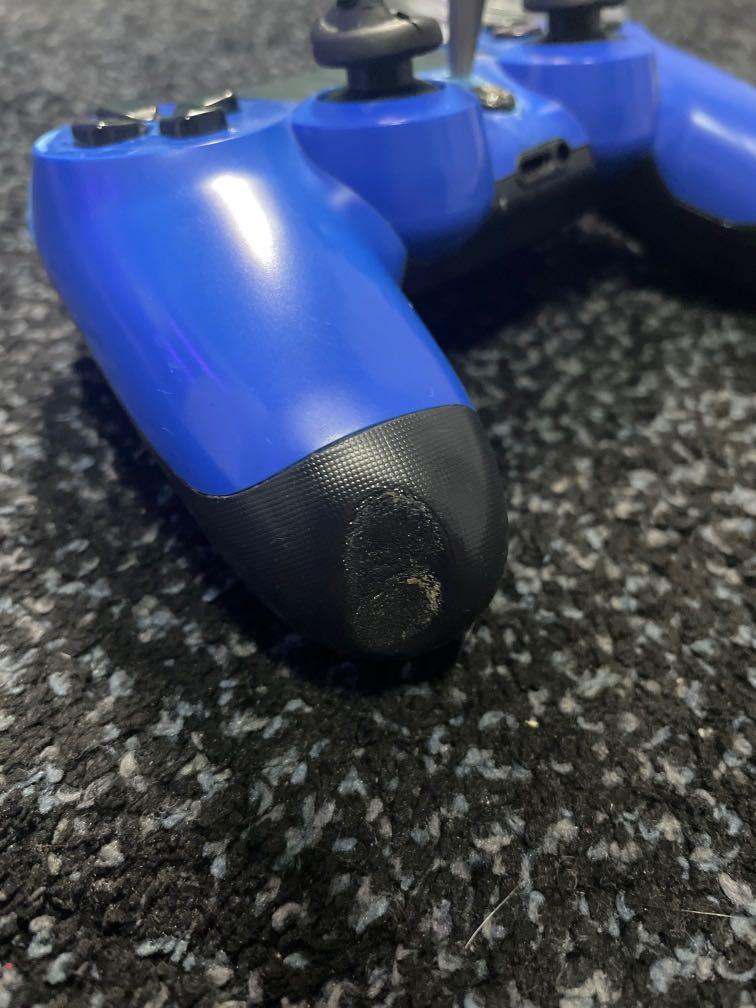 PS4 Controller (Category: Controllers) located in Singapore. Submitted by k__________________ (Listing ID 1142783979, Image 3). Description: Custom buttons Cracks for added grip Special 1 of a kind ps logo Includes scissors Comfortable joystick covers Still working Comes in blue Blue controller Black buttons Maybe broken For sweaty gamers Customised when raging in fifa .