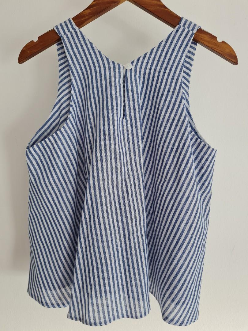 Basic and Beyond Stripes Halter Top (Category: Sleeveless) located in Quezon City. Submitted by secondthemotion (Listing ID 1143008002, Image 3). Description: Halter top from @basicandbeyond. Free size. Fits XS-S. Bias Cut. Material: cotton blue & white stripes Size measurements: Body length from shoulder - 19.5" Bust (armhole to armhole) - 18.5" (37" circumference) Status: Barely used. No damage. No labels. (It was like that when I bought it.) P
