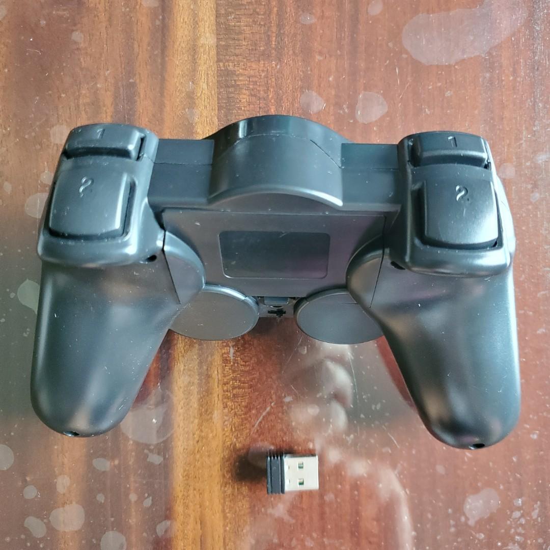 Game Controller (Category: Controllers) located in Singapore. Submitted by oraclecode (Listing ID 1142901693, Image 2). Description: Works on my Android TV and Android Phone. For Android phone you need to get your own donggle "A" as seen in the attached picture. Dongle "A" can be purchased from any IT shop. Depending on your phone port type, either get a : Type A USB to Micro USB (Old) or Type A USB to Type C USB (New) Controller + Dongle "B" inc