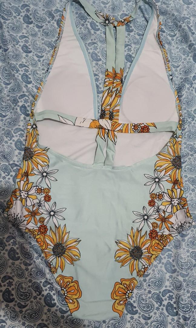 Green Floral Swimwear (Category: Bikinis & Swimsuits) located in Manila. Submitted by eeceec (Listing ID 1143058636, Image 2). Description: Green Floral Swimwear - Php 195 - Used only once - Fits Medium to Large - In very good condition and pretty when worn.