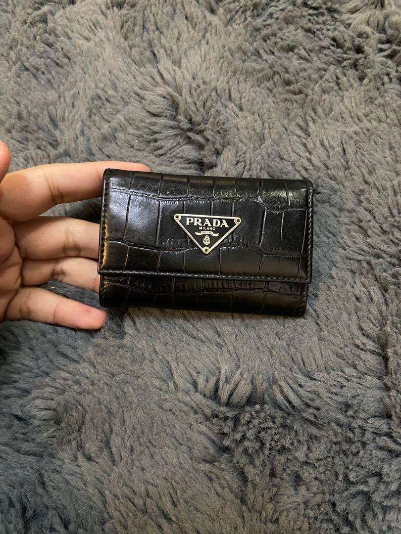 Prada Key Holder (Category: Luxury Bags & Wallets) located in Pasay City. Submitted by brennbcbe (Listing ID 1143029892, Image 1). Description: Prada Key Holder (4 hooks) Excellent condition with sign of usage Inclusion : Dust bag only.