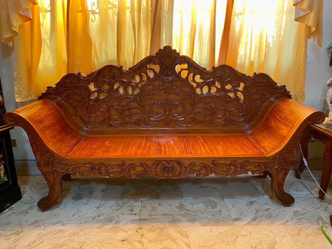 6pc Narra Cleopatra Set (Category: Sofas) located in Las Pinas. Submitted by lestrr (Listing ID 1143146898, Image 2). Description: Well-loved Narra Cleopatra Set from the 90s 1x 3-seater 2x 2-seater 1x center table with glass 2x side tables with glass (photos to follow) May have a few scratches/marks due to use and age, but nothing a new coat of varnish can't mask. Heavy set but no cracks on the legs Item location: Las Pinas City near SM Center/V