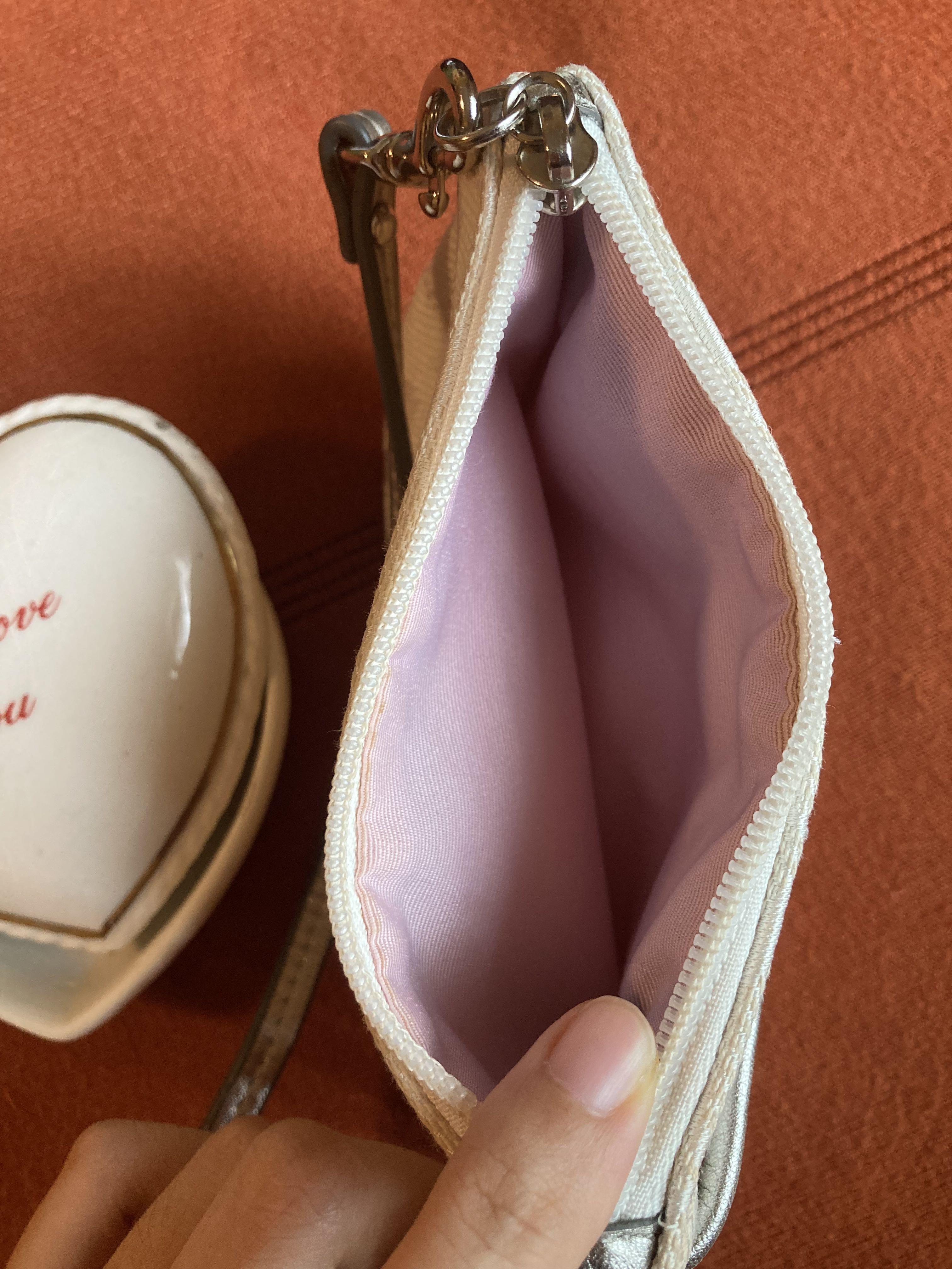 Authentic Coach Off-White Wristlet/Purse (Category: Luxury Bags & Wallets) located in Cebu City. Submitted by kawaiiparty (Listing ID 1141960689, Image 3). Description: Authentic Coach Wristlet in Off-White w/ Metallic Leather Trim Lilac inner lining Brand new but no card (threw away) PM if u need more pics :) Payments via Gcash or Bank transfer :).