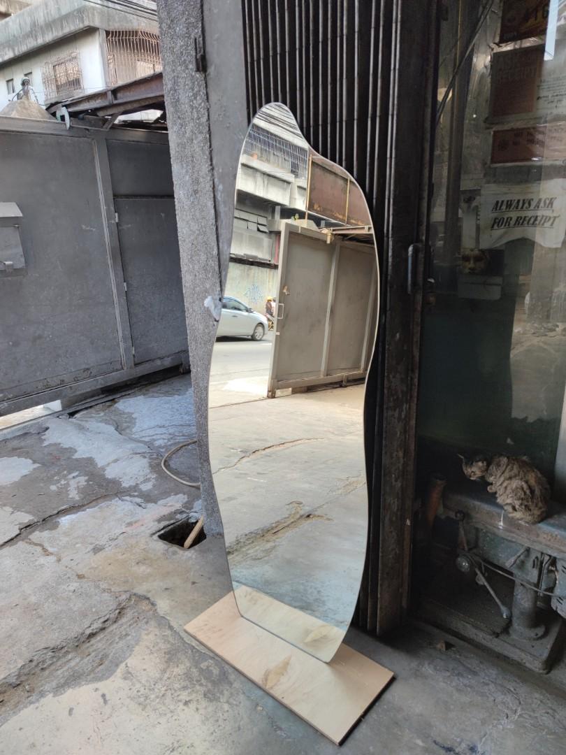 Customize shape frameless mirror (Category: Mirrors) located in Malabon City. Submitted by mirrors.ph (Listing ID 1143084315, Image 2). Description: Customize shape frameless mirror using 6mm thick copper free lead free mirror polished edges. Size: 70cm x 180cm P2400.