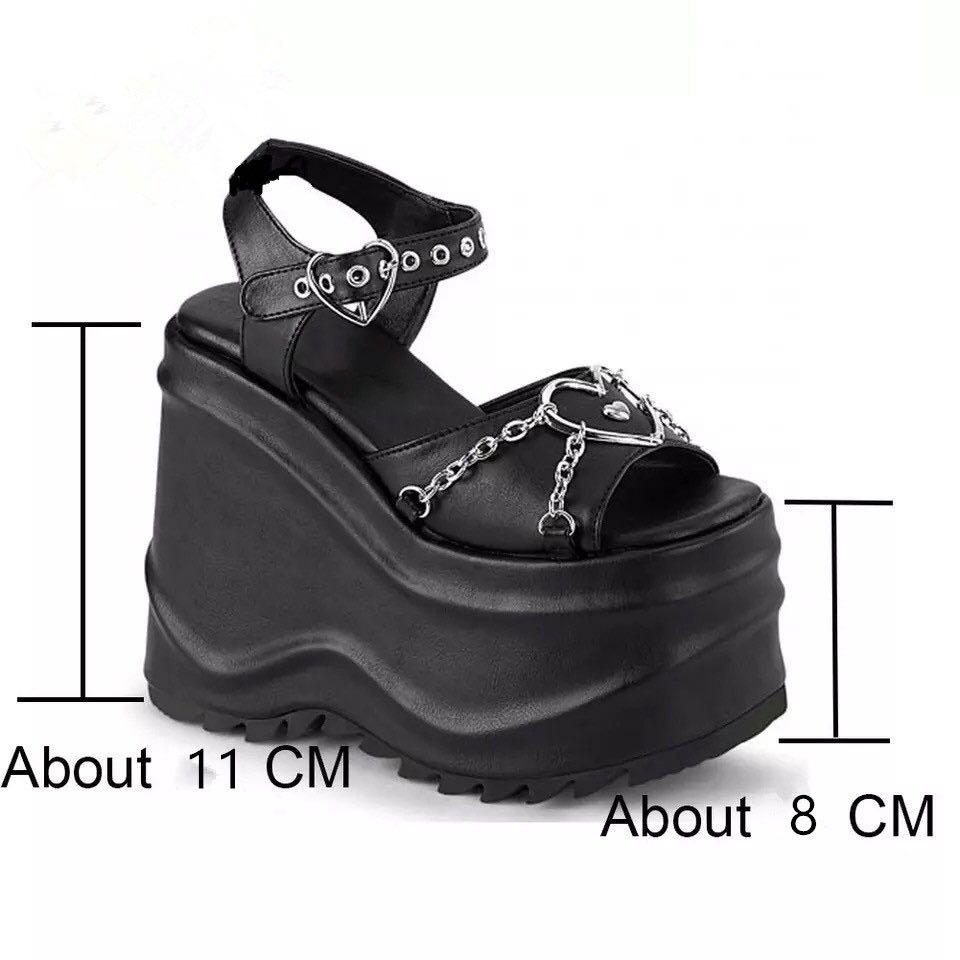 Demonia Women's Thick Wedge Platform Hook & Loop Ankle Strap Shoes (Category: Wedges) located in Taguig. Submitted by missgirladdict (Listing ID 1143168878, Image 2). Description: Demonia Women’s Thick Wedge Platform Hook & Loop Ankle Strap Shoes -very sturdy and high quality♡︎ from heel:8cm/3.14inches back heel:11cm/4.33inches weight:around650g Pre-order (ETA: 7-14 days) Color: Shiny Black US size US5=35=22.5CM US5.5=36=23CM US6=37=23.5CM US6.5=