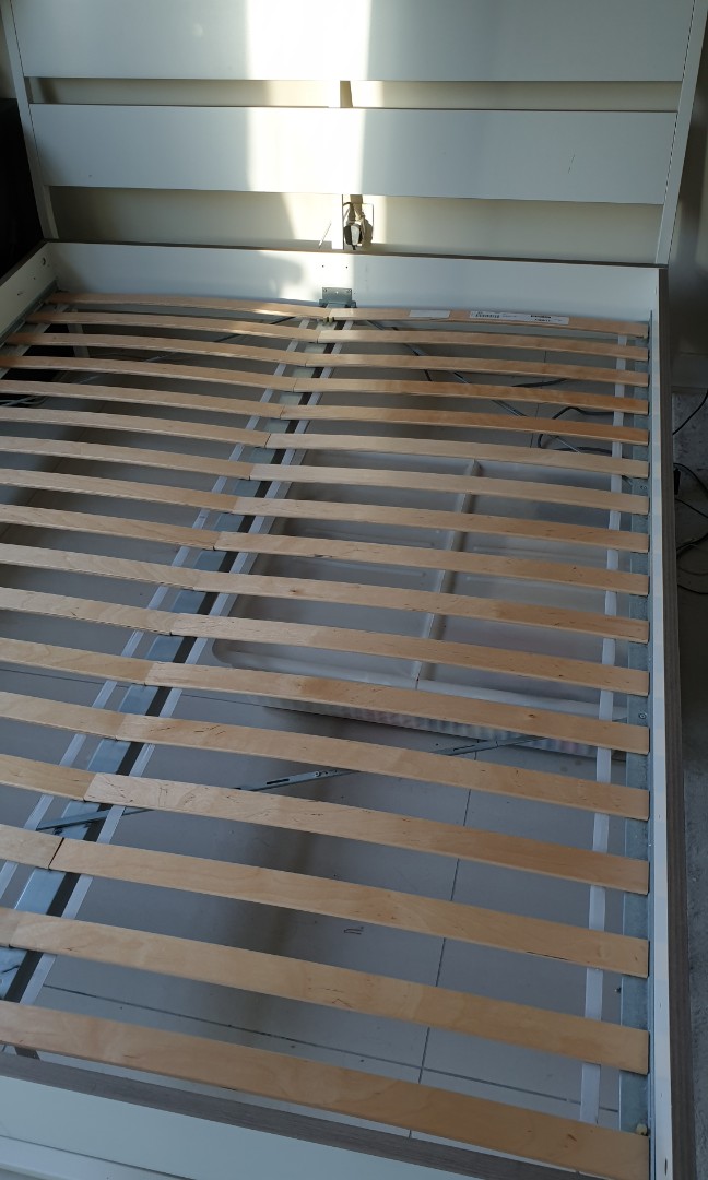 Ikea Bed, great condition. European Queen. ( Pics of it being dismantled and ready to ship ) 201