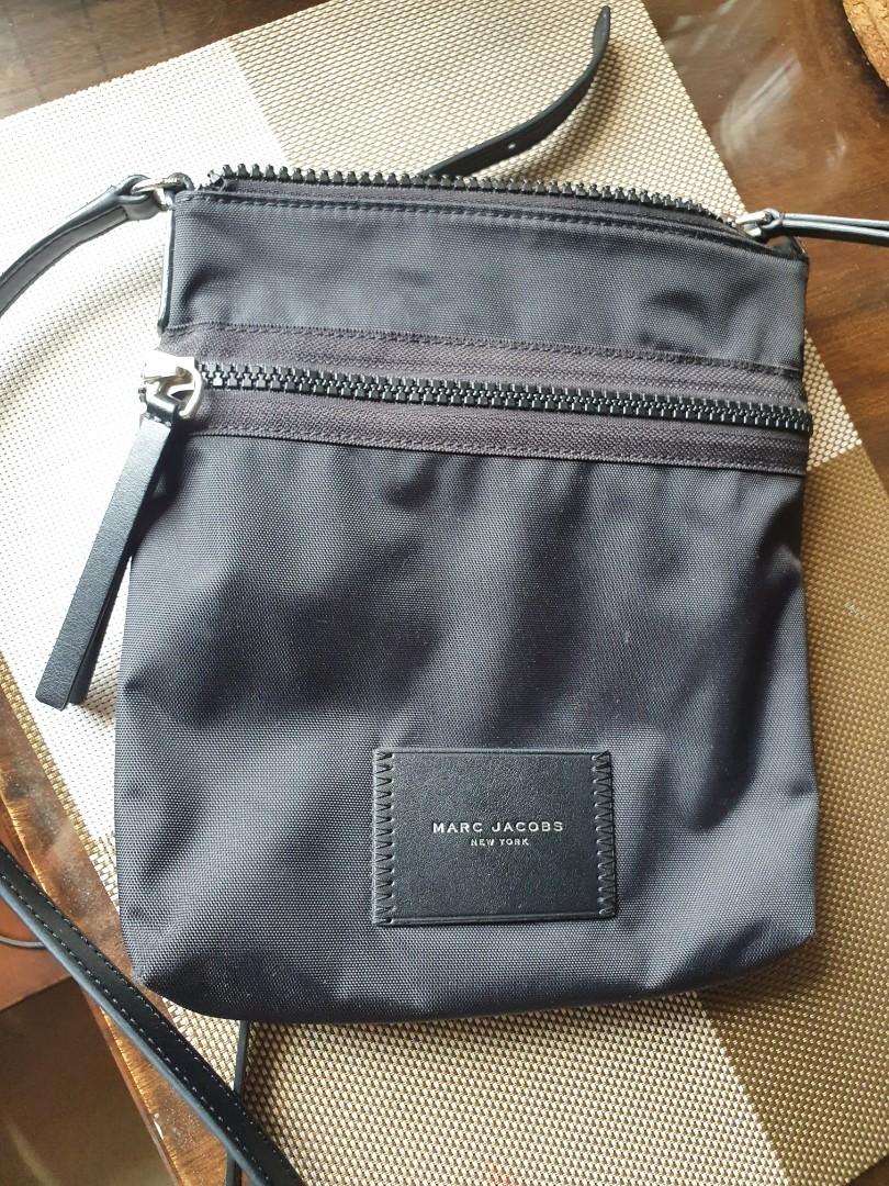 Original Marc Jacobs sling bag with authenticity card (Category: Cross-body Bags) located in Pasig City. Submitted by bubbles2022 (Listing ID 1143099715, Image 3). Description: Original Marc Jacobs sling bag with authenticity card. Like New condition. used a couple of times only..