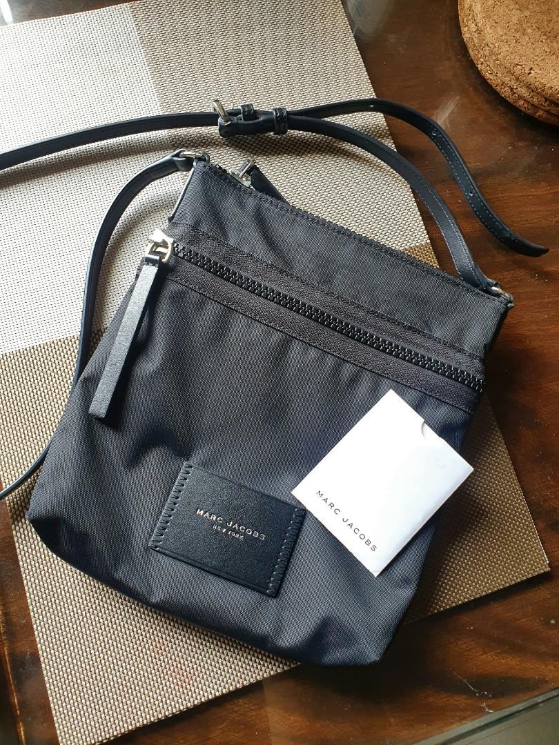 Original Marc Jacobs sling bag with authenticity card (Category: Cross-body Bags) located in Pasig City. Submitted by bubbles2022 (Listing ID 1143099715, Image 1). Description: Original Marc Jacobs sling bag with authenticity card. Like New condition. used a couple of times only..