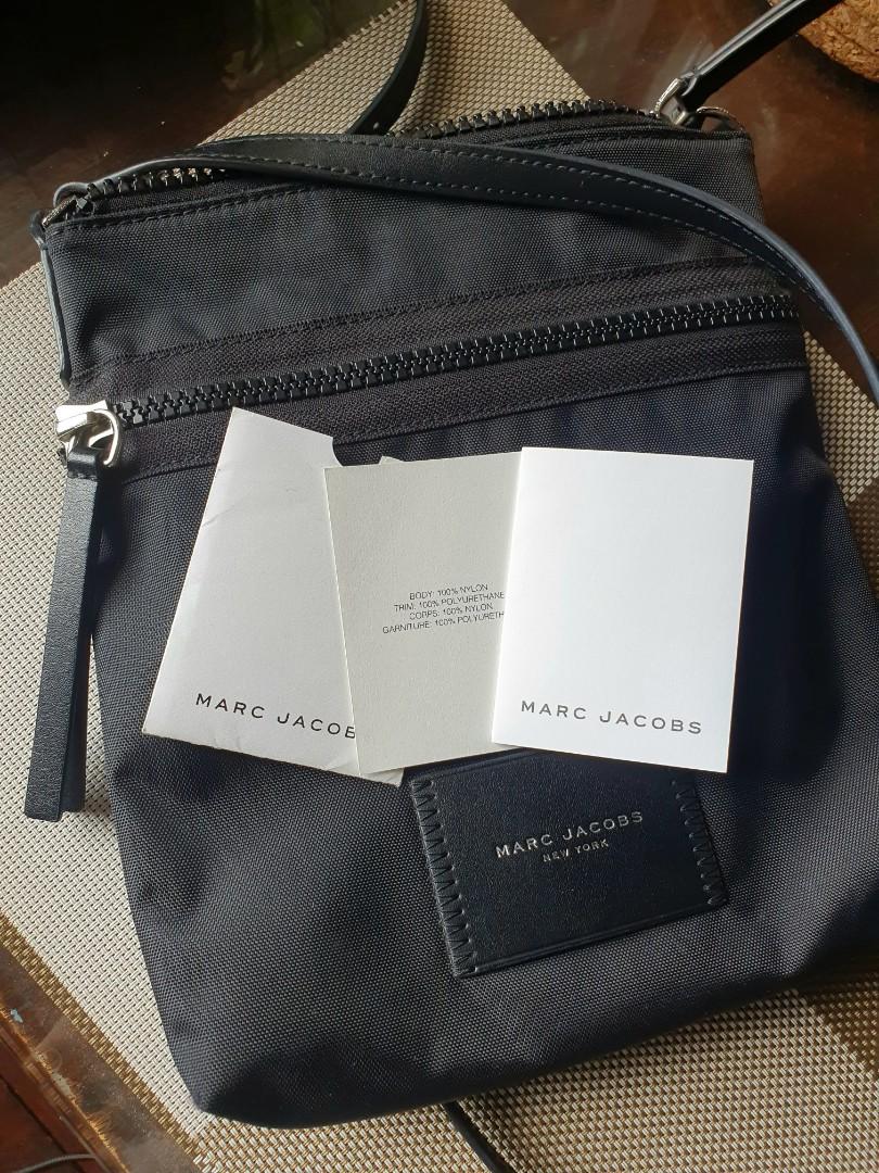 Original Marc Jacobs sling bag with authenticity card (Category: Cross-body Bags) located in Pasig City. Submitted by bubbles2022 (Listing ID 1143099715, Image 2). Description: Original Marc Jacobs sling bag with authenticity card. Like New condition. used a couple of times only..