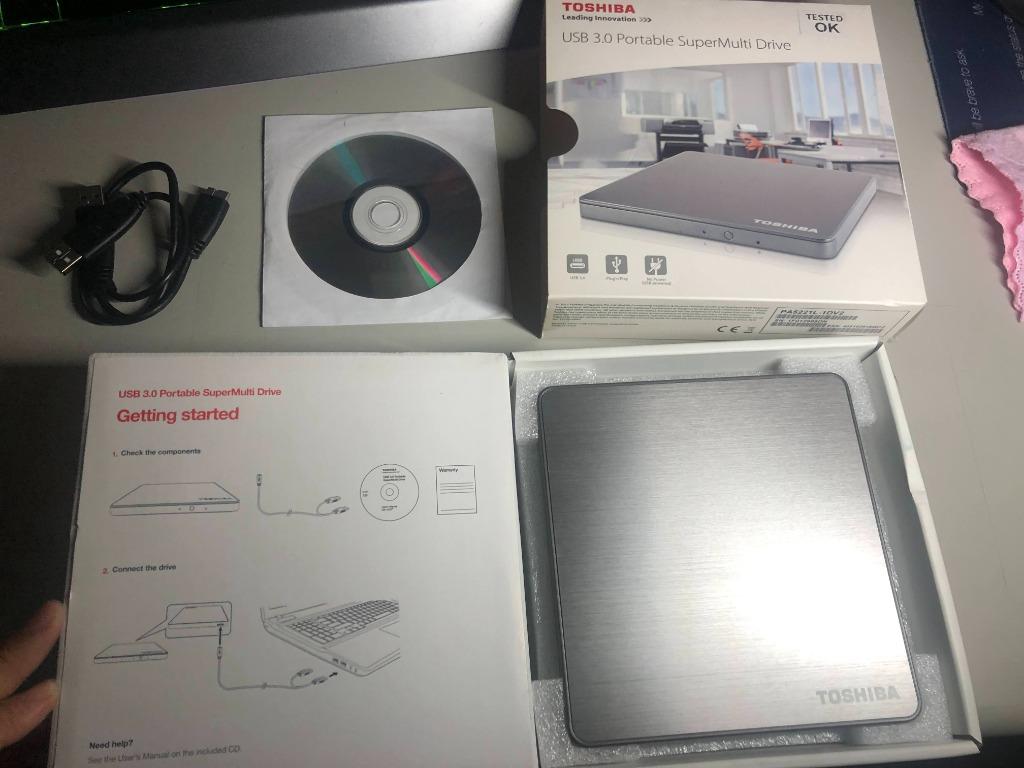 USB 3.0 Portable SuperMulti Drive (Category: Computer Parts) located in Quezon City. Submitted by outoftheboxph (Listing ID 1143219294, Image 3). Description: Toshiba USB 3.0 Portable SuperMulti Drive/ Model No.: PA5221L-1DV2 Portable / External DVD rom Plug and Play With the compact and stylish Toshiba SuperMulti Drive, you can use DVDs externally on the go – and play movies, load software, and backup files with ease. Installation is fast and si