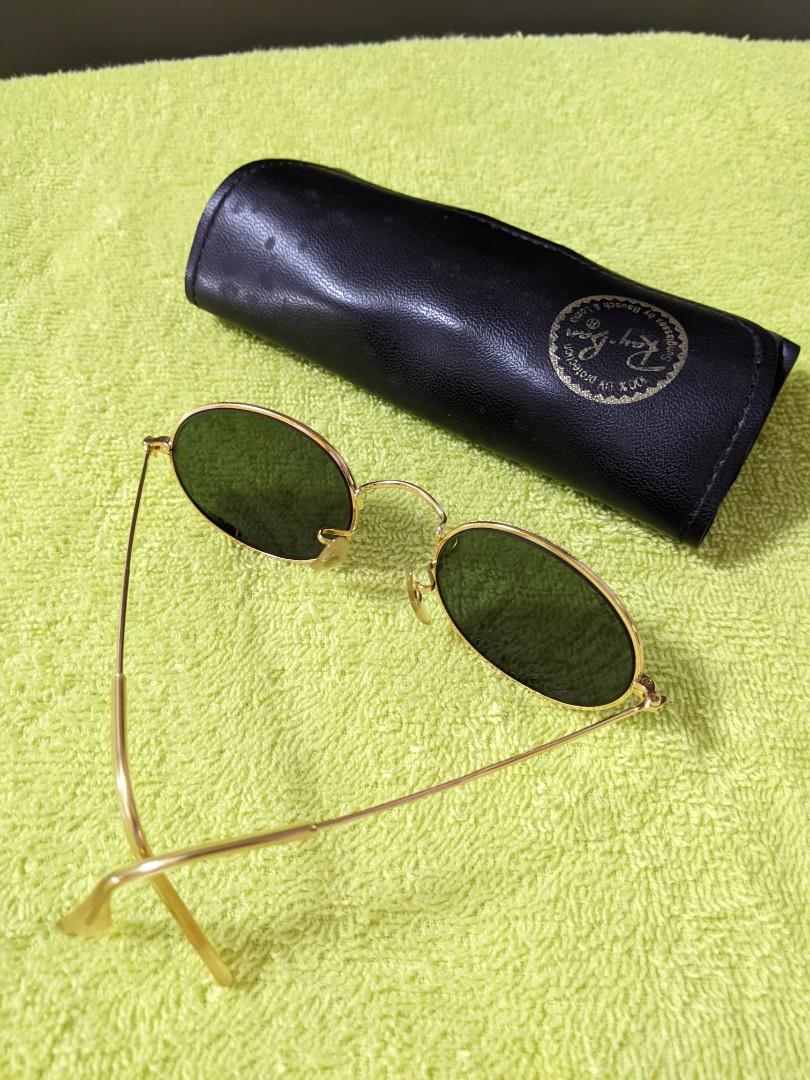 Sold at Auction: RAY-BAN RB3547 9196/31 oval gold tone frame, green lens  Sunglasses