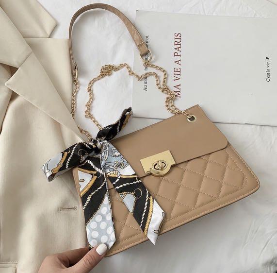 Vogue sale sling bags