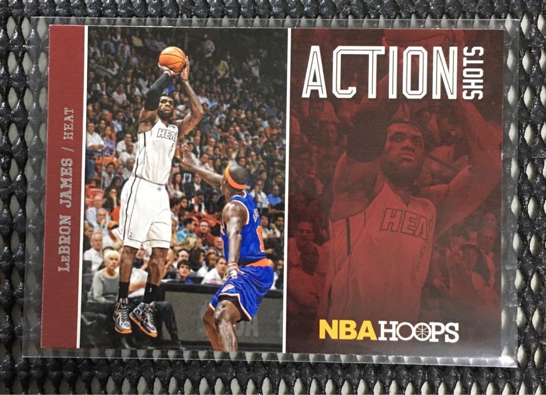 2013-14 Panini NBA Hoops LeBron James Action Shots Insert. (Category: Raw Singles) located in Quezon City. Submitted by chasinglegends (Listing ID 1143402461, Image 1). Description: 2013-14 Panini NBA Hoops LeBron James Action Shots Insert - w/ small tiny white marks on 3 corners. Includes Plastic Sleeve & Top Loader Case. .