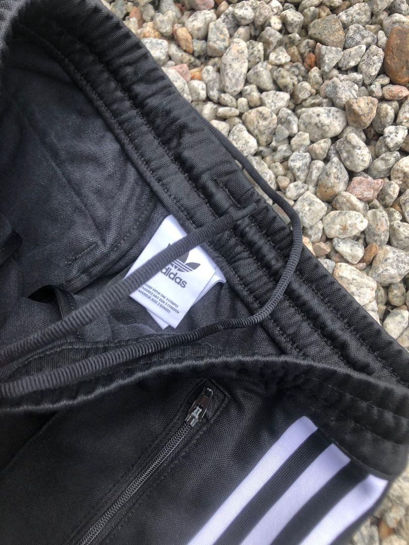 Adidas track pants slim fit, Men's Fashion, Bottoms, Joggers on Carousell