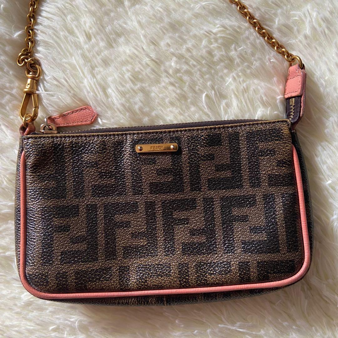 Fendi Pochette Zucca Coated Canvas (Category: Luxury Bags & Wallets) located in Las Pinas. Submitted by Le.Pattie.Luxe (Listing ID 1143304606, Image 3). Description: 💯% Authentic 𝐅𝐞𝐧𝐝𝐢 𝐏𝐨𝐜𝐡𝐞𝐭𝐭𝐞 𝐙𝐮𝐜𝐜𝐚 𝐂𝐨𝐚𝐭𝐞𝐝 𝐂𝐚𝐧𝐯𝐚𝐬 🤎𝐏𝐡𝐩 𝟏𝟔𝐤🤎 ▪️7.8/10 condition w/ corner rubs & dirt inside ▪️W/ certificate of authenticity fr Bagaholic101 ▪️Can be worn shoulder/hand bag ▪️Approx size: L- 7.5” x H- 4.5” ▪️Material: PVC 💯% authe