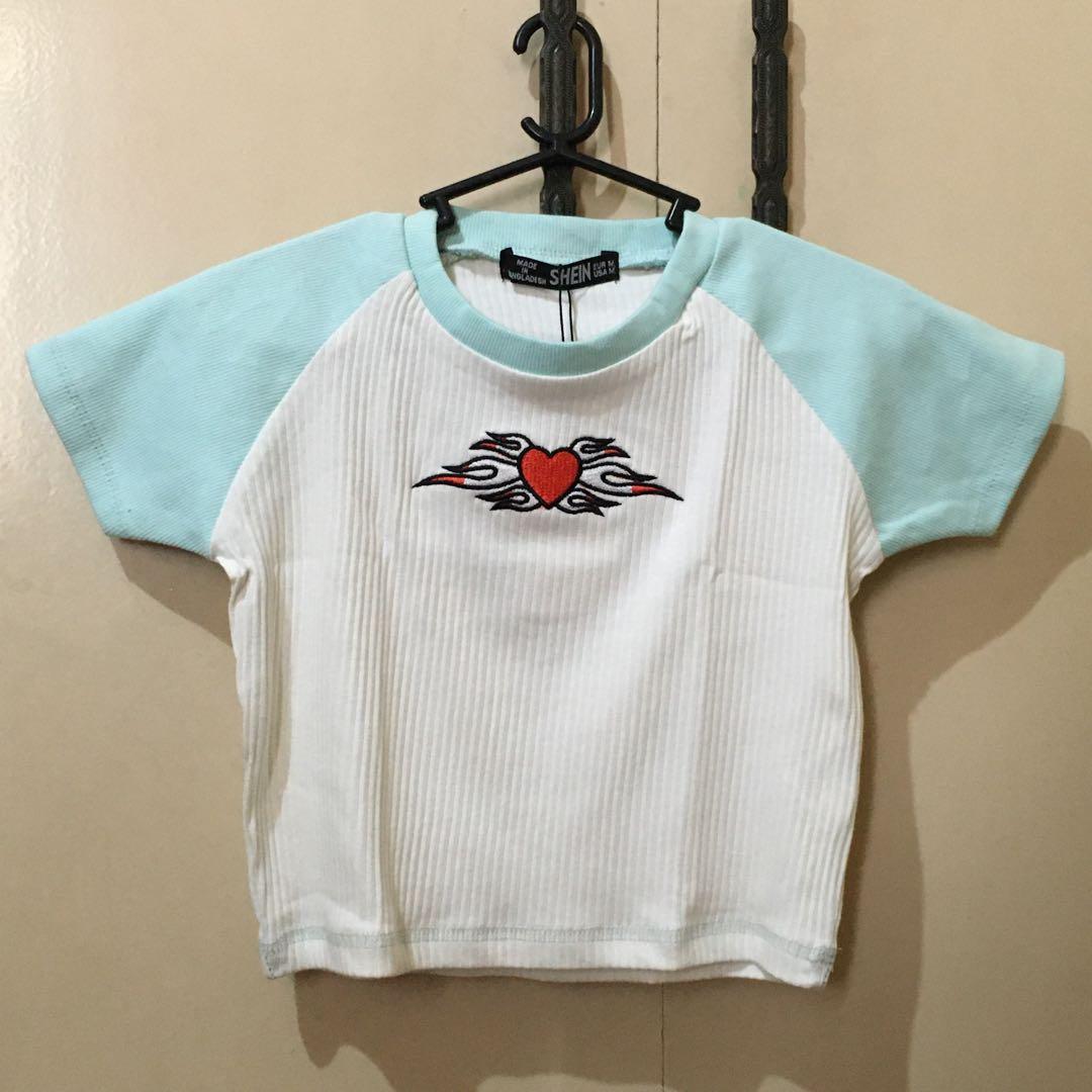 SHEIN FREEBIE (Category: Babies & Kids Fashion) located in Quezon City. Submitted by thriftees21 (Listing ID 1143432025, Image 2). Description: SHEIN FREEBIE FOR 400UP PURCHASE SUPER NICE RIBEED BABY TEE.