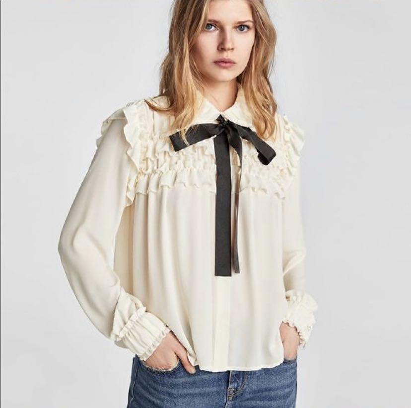 Ruffle blouse with sales bow