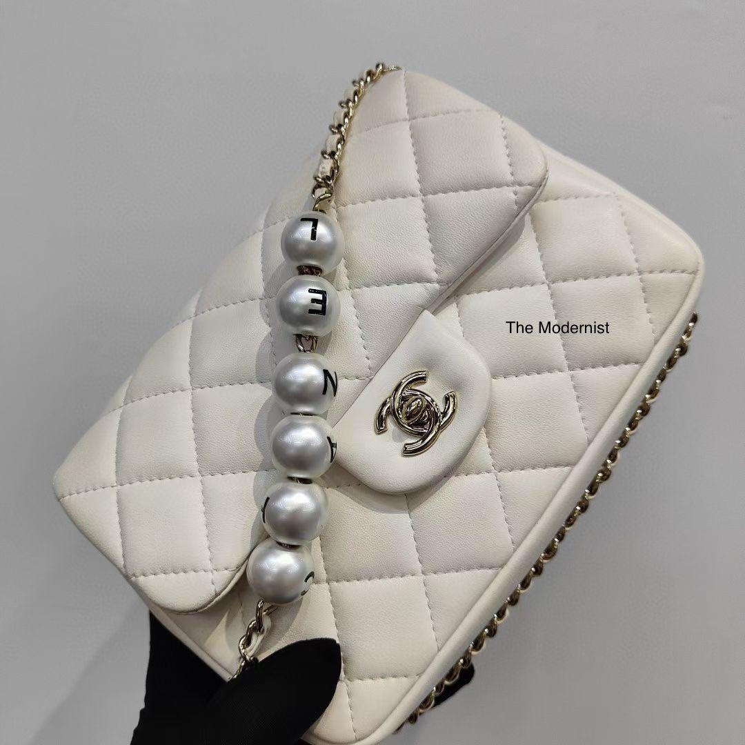 Authentic Chanel Pearl Logo White Lambskin Chain Flap Bag Light Gold  Hardware, Luxury, Bags & Wallets on Carousell