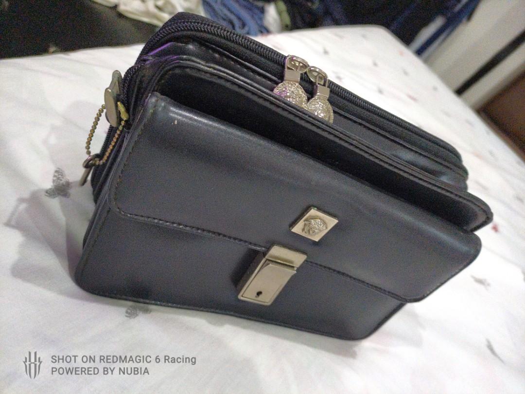 Original Versace Vintage Clutch Bag (Category: Luxury Bags & Wallets) located in Manila. Submitted by alfredaguirre0819 (Listing ID 1143670623, Image 1). Description: selling my Original Versace Vintage Clutch Bag selling for 5k only Bnew price 40k no issues, Very Rare Trade for PS4 or Nintendo switch games location Taguig or Pasig thanx for viewing my ad. gb.