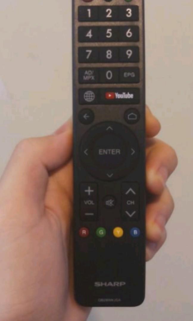 Realmi / Sharp TV Remote (Category: Electrical, Adaptors & Sockets) located in Angeles City. Submitted by goodbuysathome (Listing ID 1143623915, Image 3). Description: original realmi and Sharp tv remote.