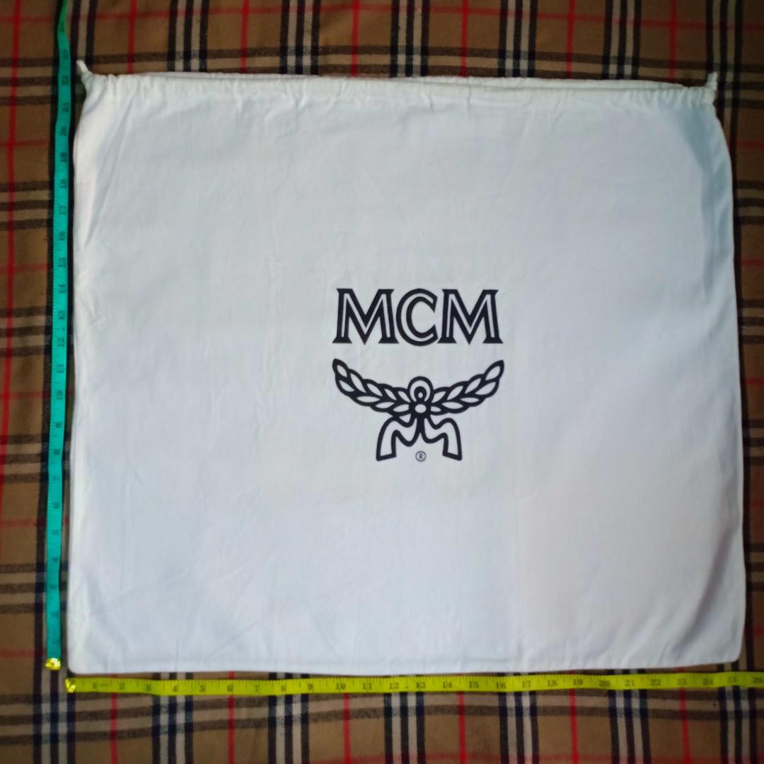 Authentic MCM dust bag 21x24 inches (Category: Luxury Bags & Wallets) located in Binangonan. Submitted by jfluxury.co (Listing ID 1143727531, Image 2). Description: excellent condition no flaws bought in Japan 🇯🇵 💯% guaranteed authentic.😊 money back kapag fake po.😊 clean and ready to use na.😊.