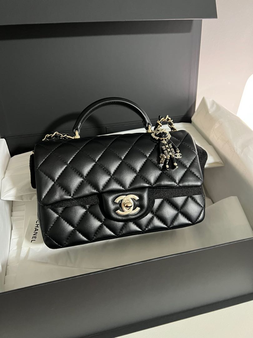 CHANEL Mini flap bag with top handle w coco chanel charm, Luxury, Bags &  Wallets on Carousell