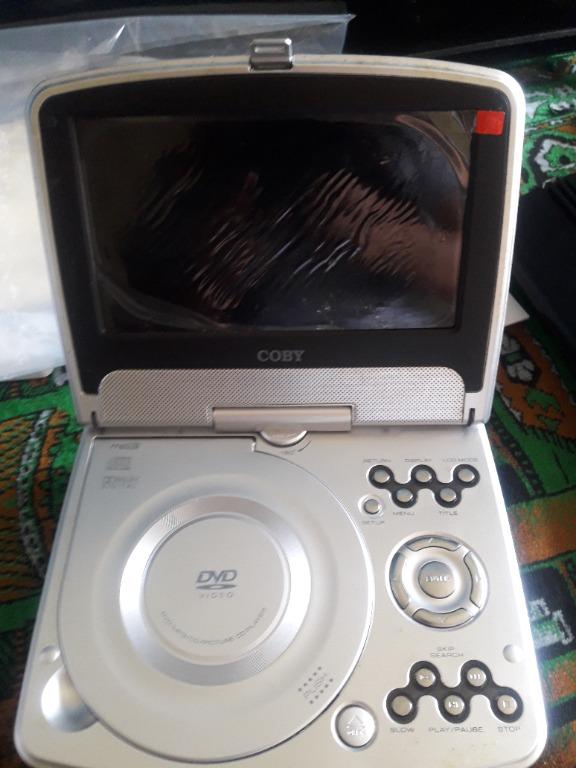 coby dvd player (Category: TV Parts & Accessories) located in Manila. Submitted by rionava (Listing ID 1143794103, Image 3). Description: for sale 7"tft portable dvd player with swivel screen rush sale for details and other inquiries just contact the seller at 09363585485.