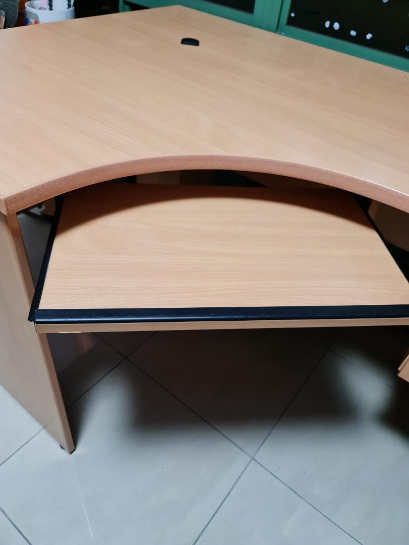 Computer desk (Category: Tables & Sets) located in Singapore. Submitted by nglnteo (Listing ID 1143798544, Image 2). Description: V Hive Office desk with locked drawer. H = 75cm L= 150cm W = 100cm L=60cm W = 60cm.