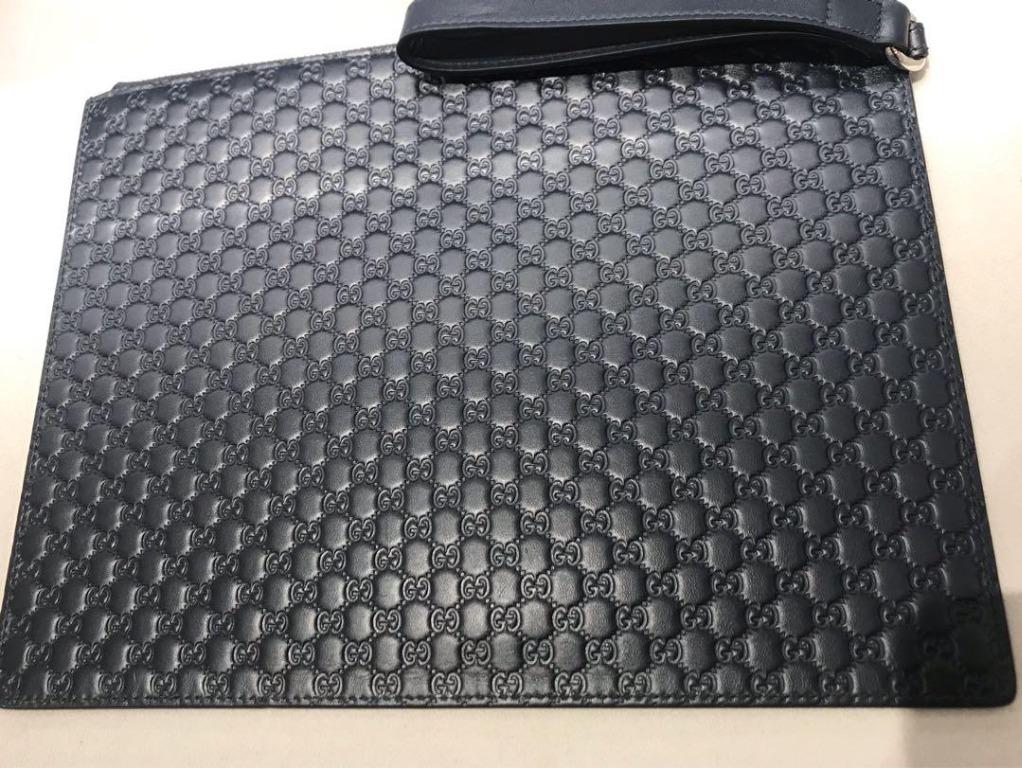 Gucci hot sale embossed clutch