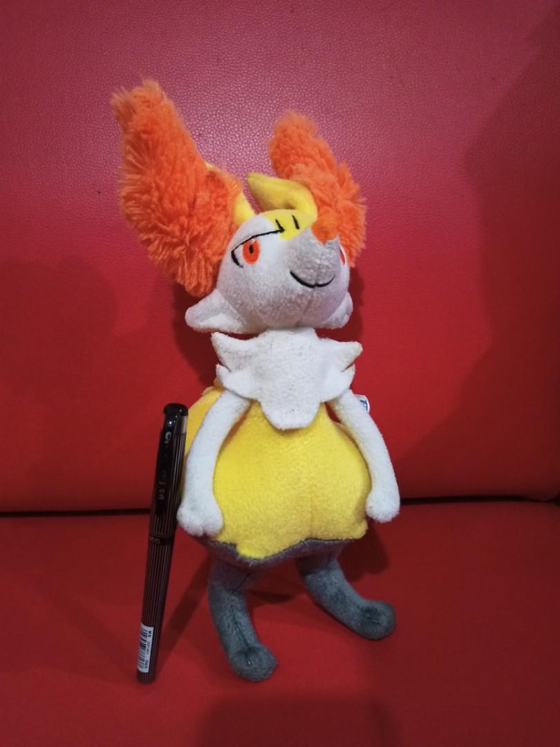 Pokemon center 2025 braixen plush
