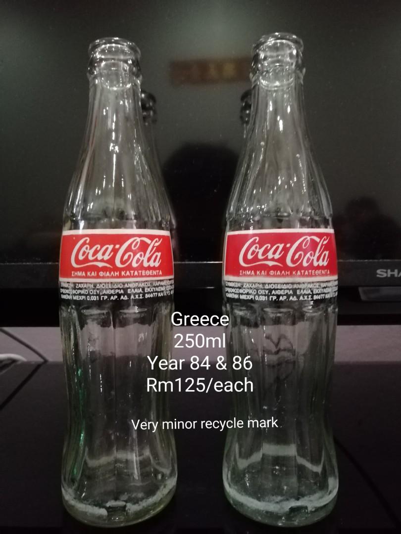 https://media.karousell.com/media/photos/products/2022/2/16/coca_cola_greece_acl_bottle_1645018944_d4387081_progressive.jpg