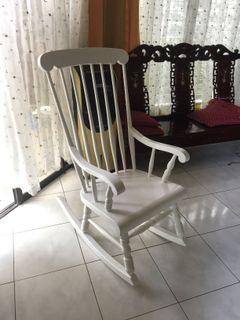 White wooden rocking chair
