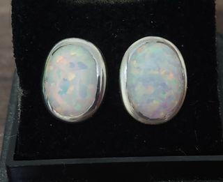9 x 7mm Lab Created Opal. Silver Earrings.
