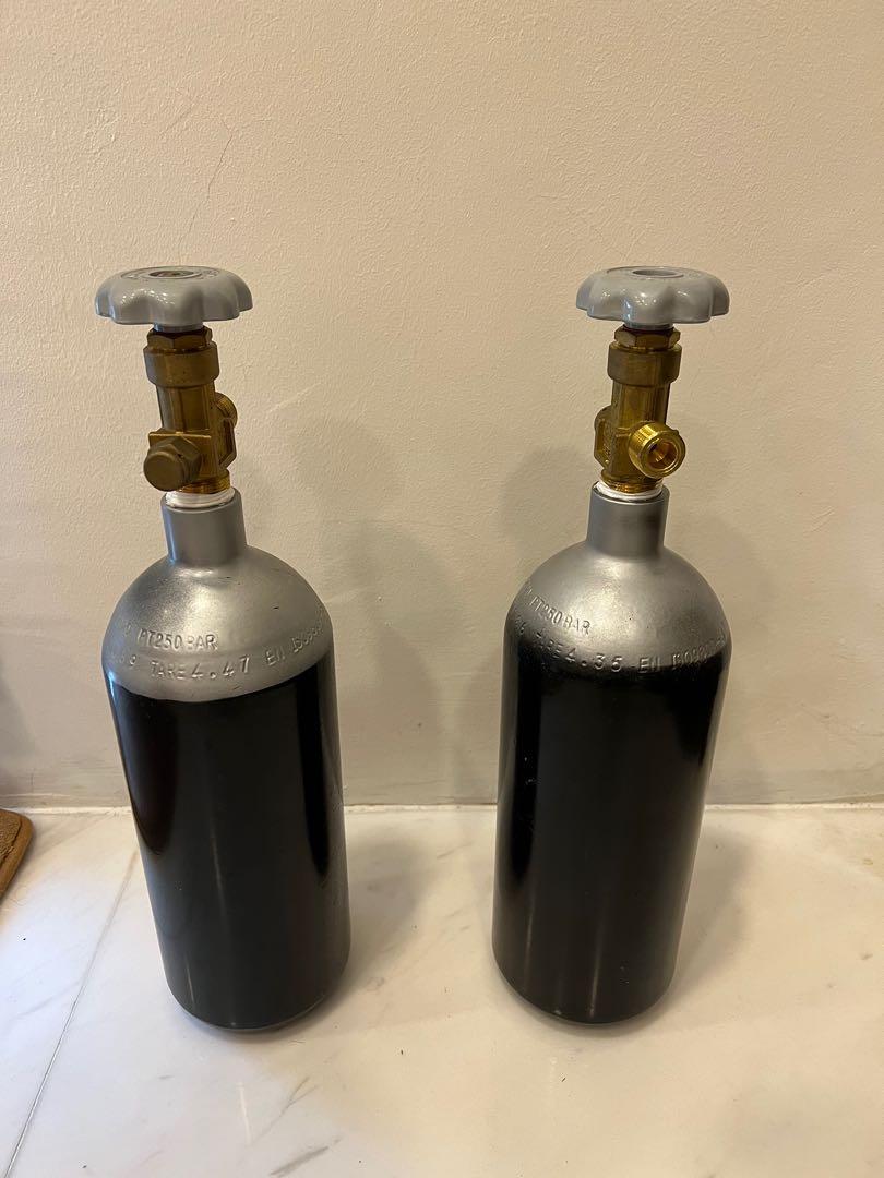 CO2 Canisters (2L one half full, one empty) and OF solenoid regulator