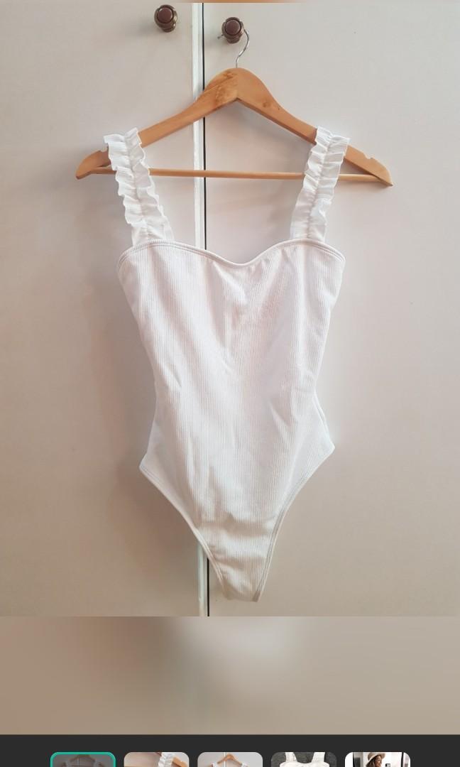 Ruffled one piece (Category: Bikinis & Swimsuits) located in Marikina City. Submitted by declutterkpcloset (Listing ID 1144112561, Image 1). Description: used once! from oceandeck.ph.