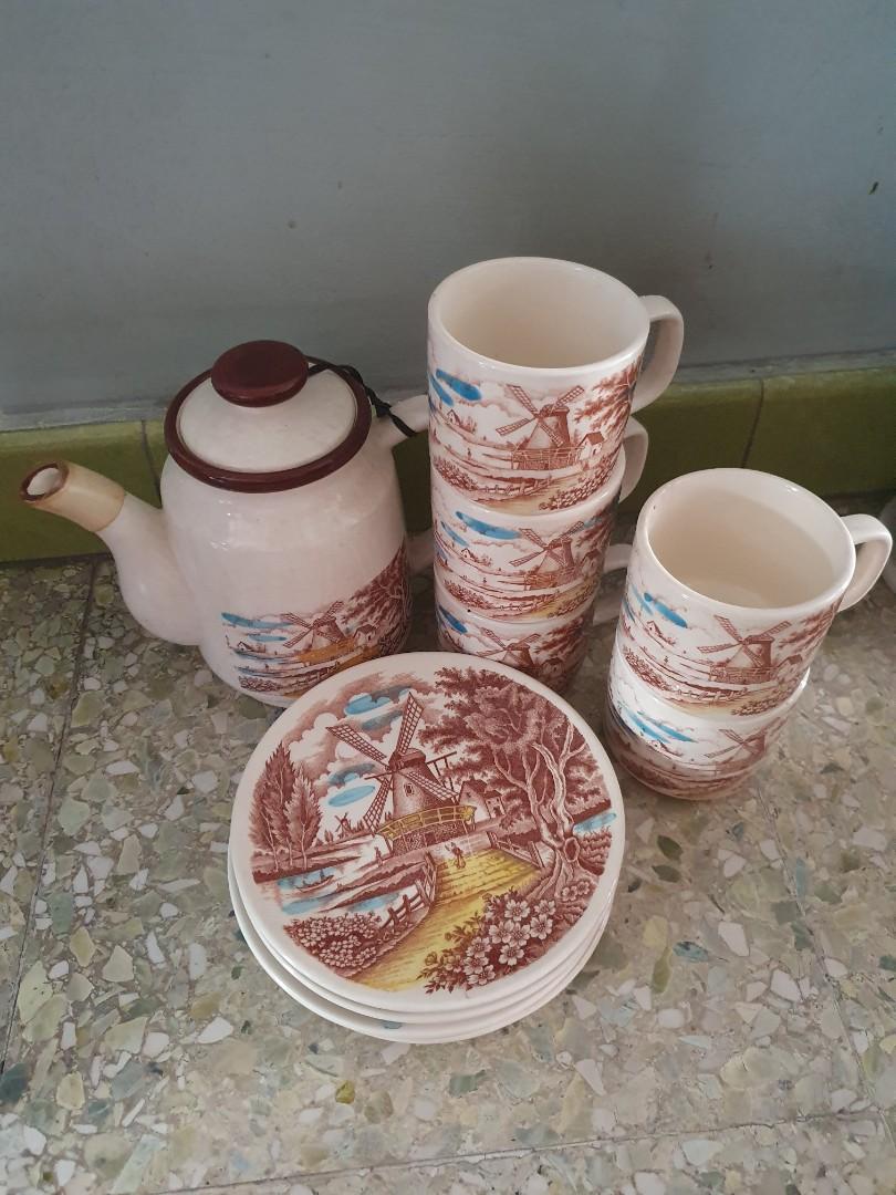 Tea set (Category: Coffee & Tea Tableware) located in Singapore. Submitted by summertan1 (Listing ID 1144247239, Image 2). Description: The height of teapot with cover is 18cm and without cover is 15cm. Diameter of teapot is 5.5 cm. Diameter of cup is 6cm and diameter of plate is 15cm..