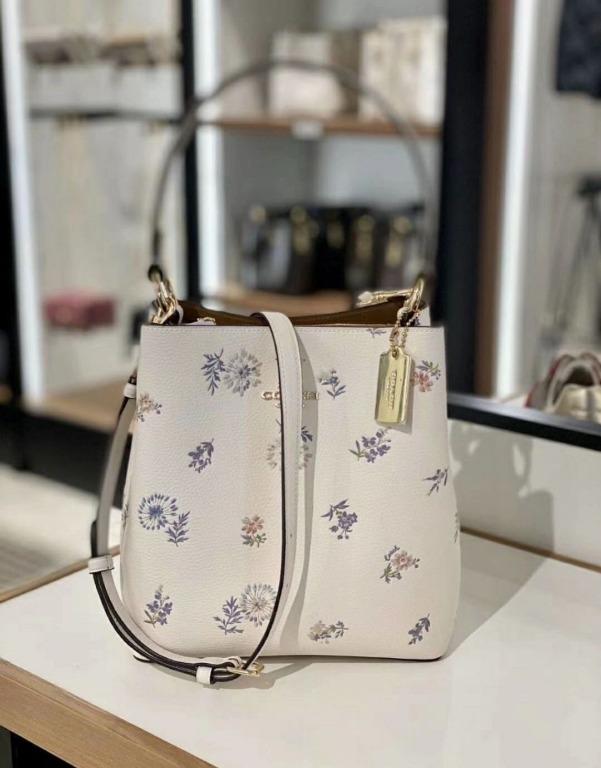 Coach floral print purse sales