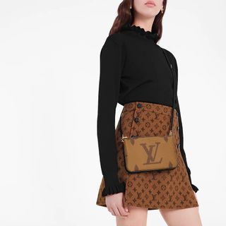 Louis Vuitton Double Zip Pochette Giant Monogram Jungle, Luxury, Bags &  Wallets on Carousell