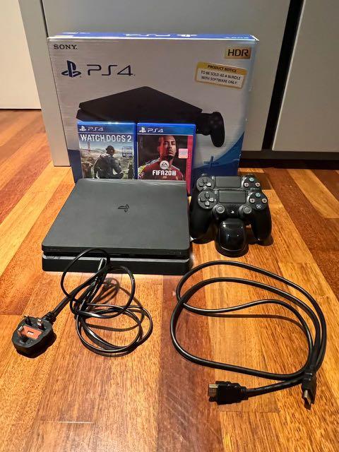 PS4 Slim 500gb w 2 original controllers Fifa 20 and Watch Dogs 2 included